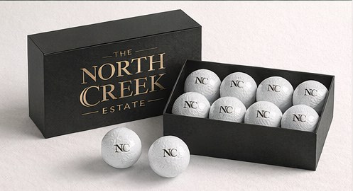 The Grounds Set — one dozen North Creek logo golf balls